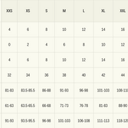 Marguerite Satin-Halterkleid in Midi-Länge mit schwarz-weißen Punkten